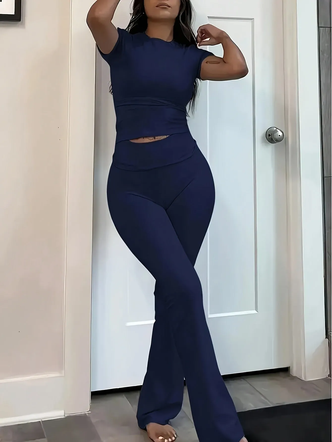 Sleek Fitted Short Sleeve Top and High-Waisted Flare Pants Set