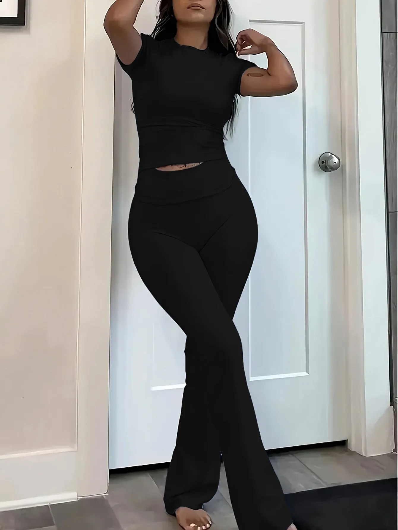 Sleek Fitted Short Sleeve Top and High-Waisted Flare Pants Set