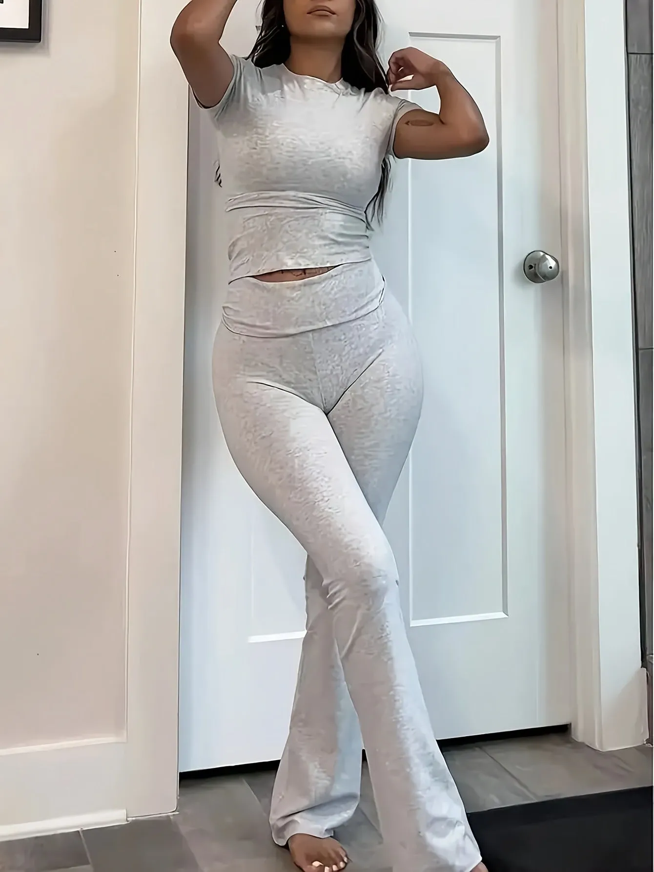 Sleek Fitted Short Sleeve Top and High-Waisted Flare Pants Set