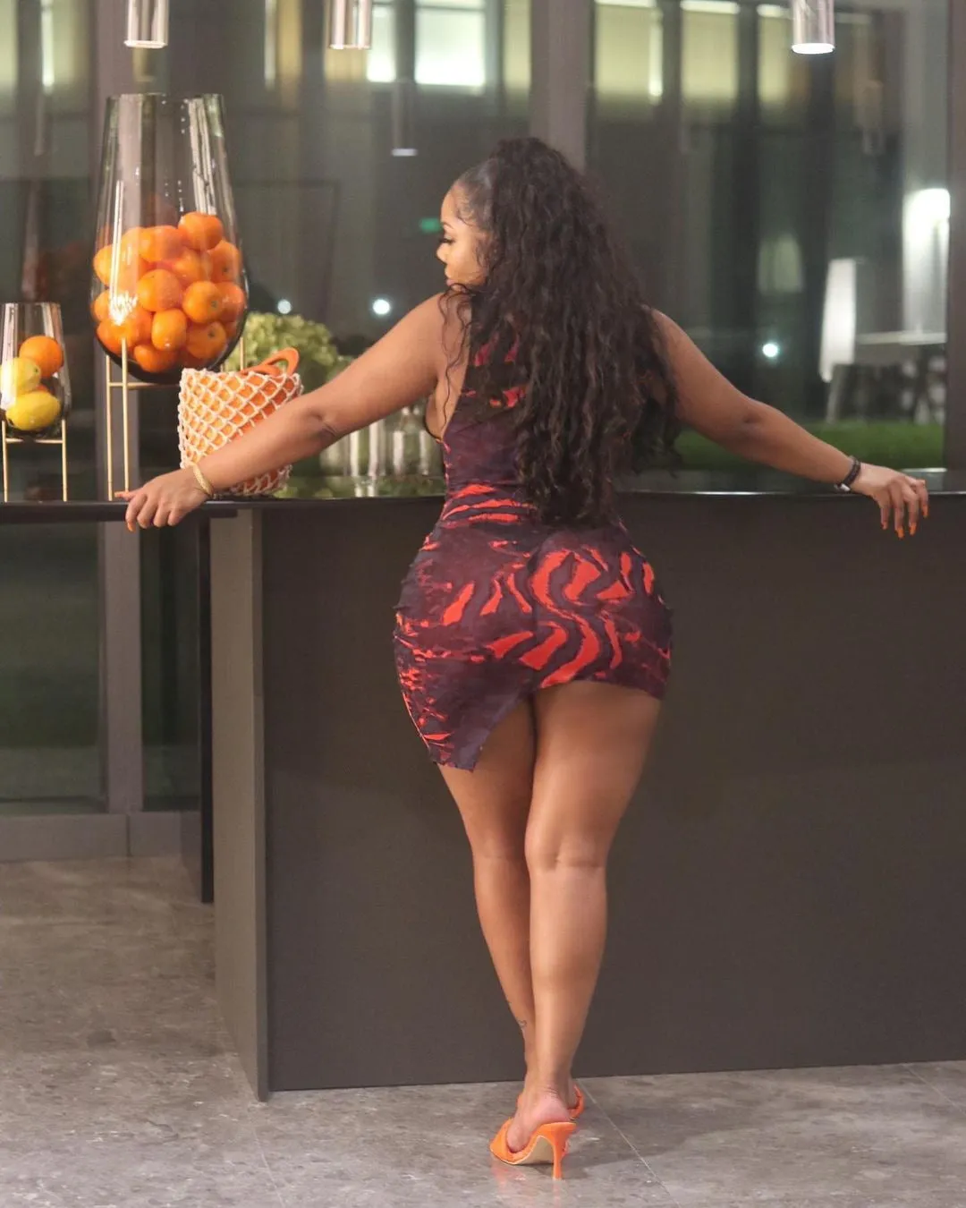 Sleek Printed Sleeveless Bodycon Dress with Eye-Catching Design