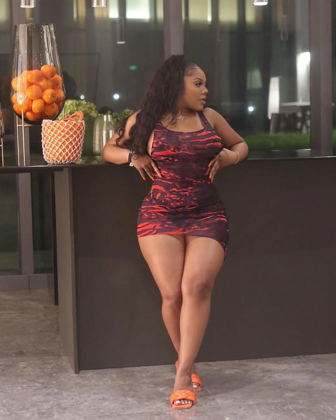 Sleek Printed Sleeveless Bodycon Dress with Eye-Catching Design